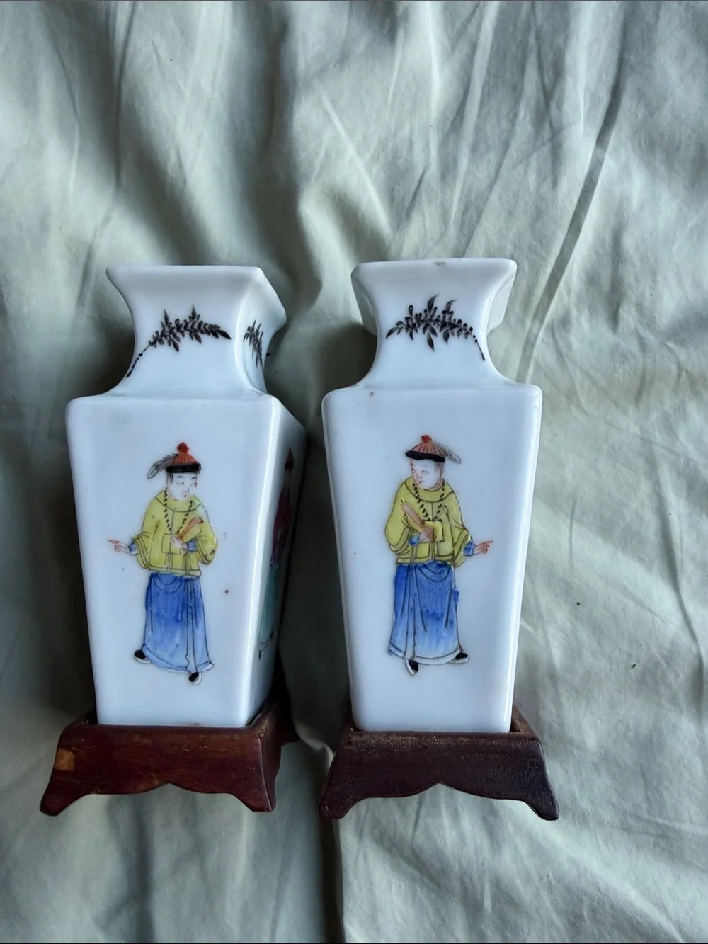 Pair of White Porcelain Vases with Hand-Painted Figures